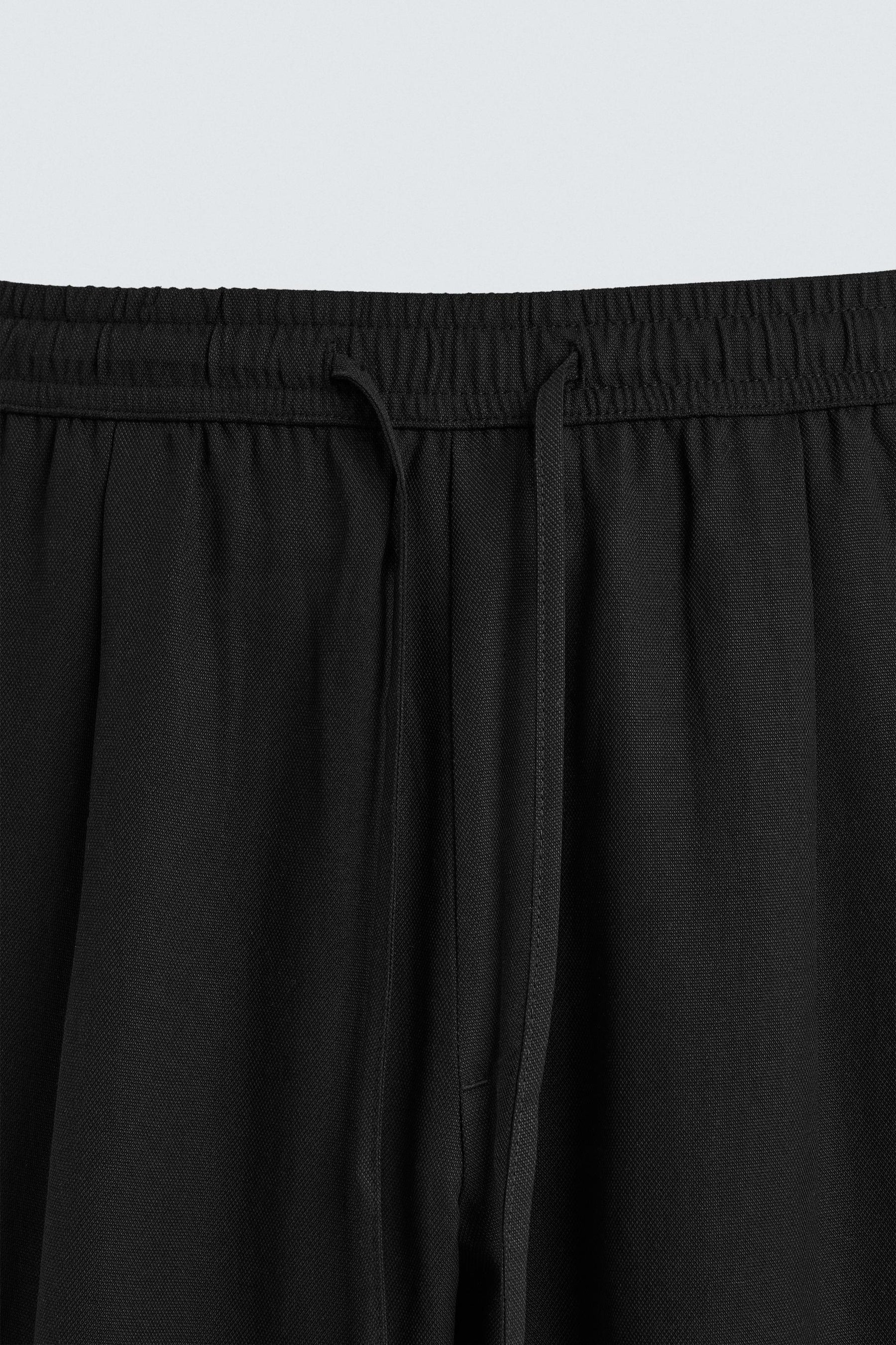 RELAXED FIT FLOWING TROUSERS - Image 8