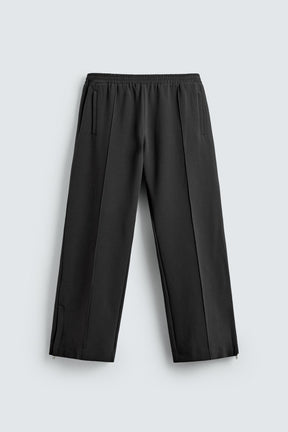 FLOWING TROUSERS WITH ZIPS - Image 6
