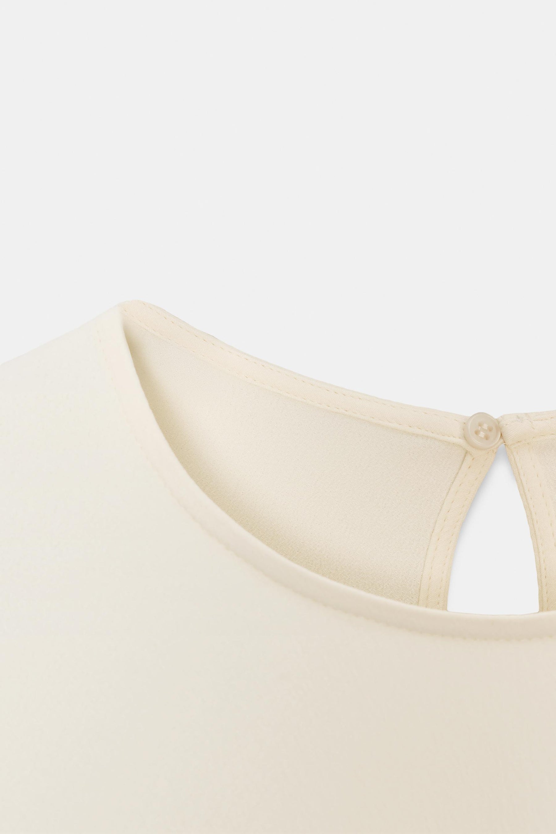 Asymmetric flowing blouse