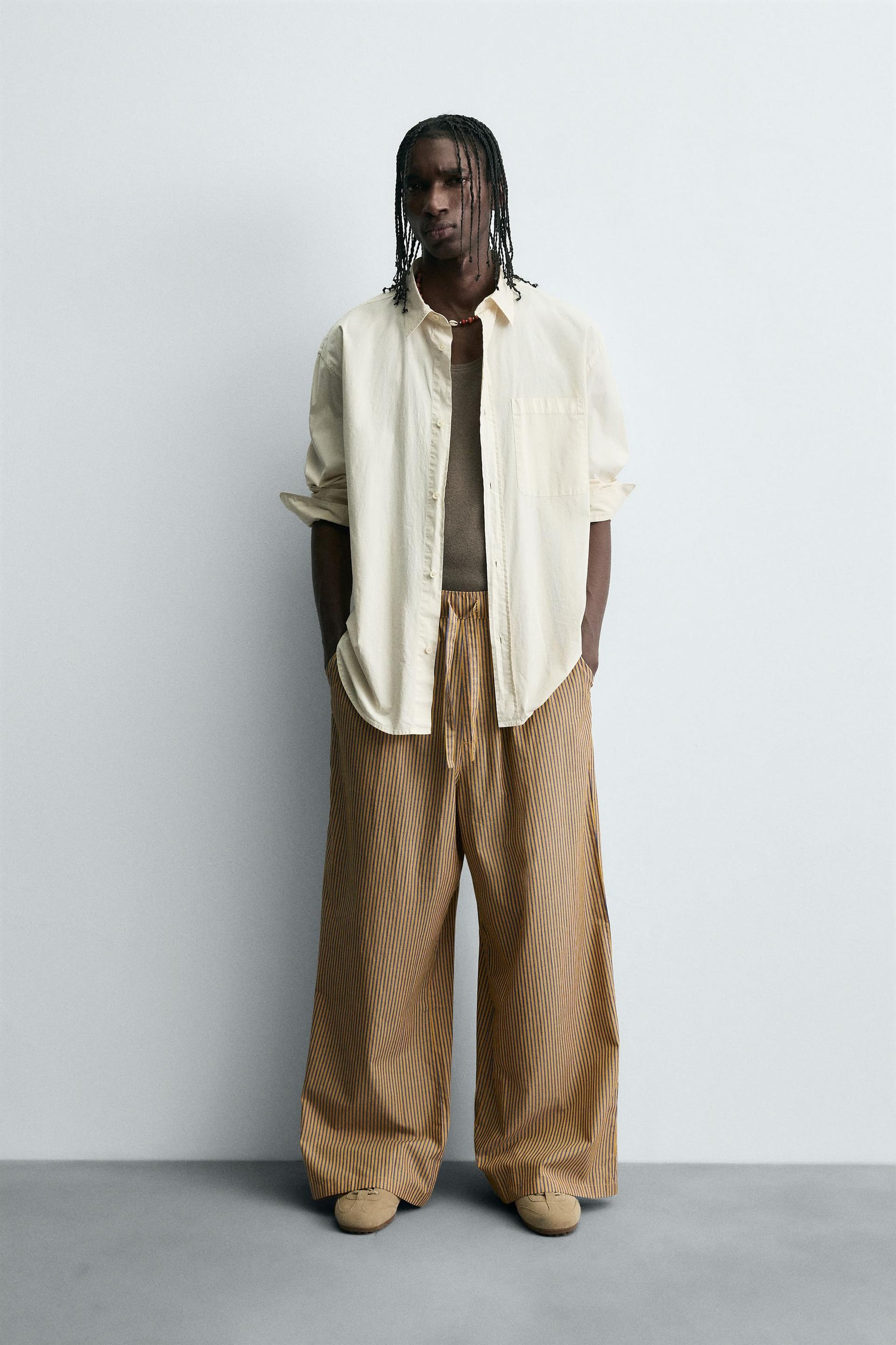 STRIPED OVERSIZE FIT TROUSERS - Image 1