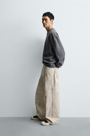 ABSTRACT PRINT TEXTURED TROUSERS - Image 4