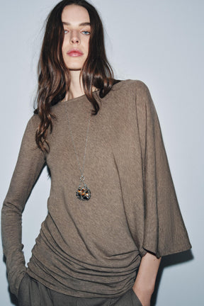 ASYMMETRIC CAPE TOP