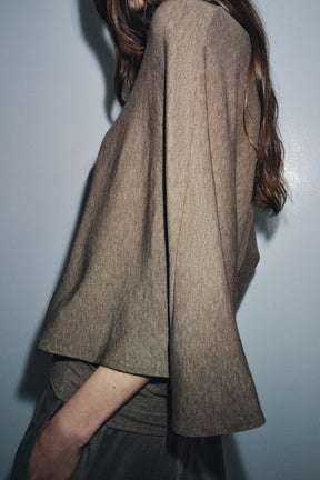 ASYMMETRIC CAPE TOP