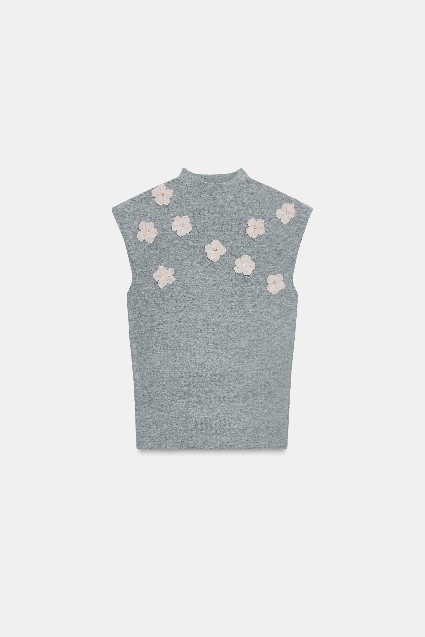 Floral embellished relief top