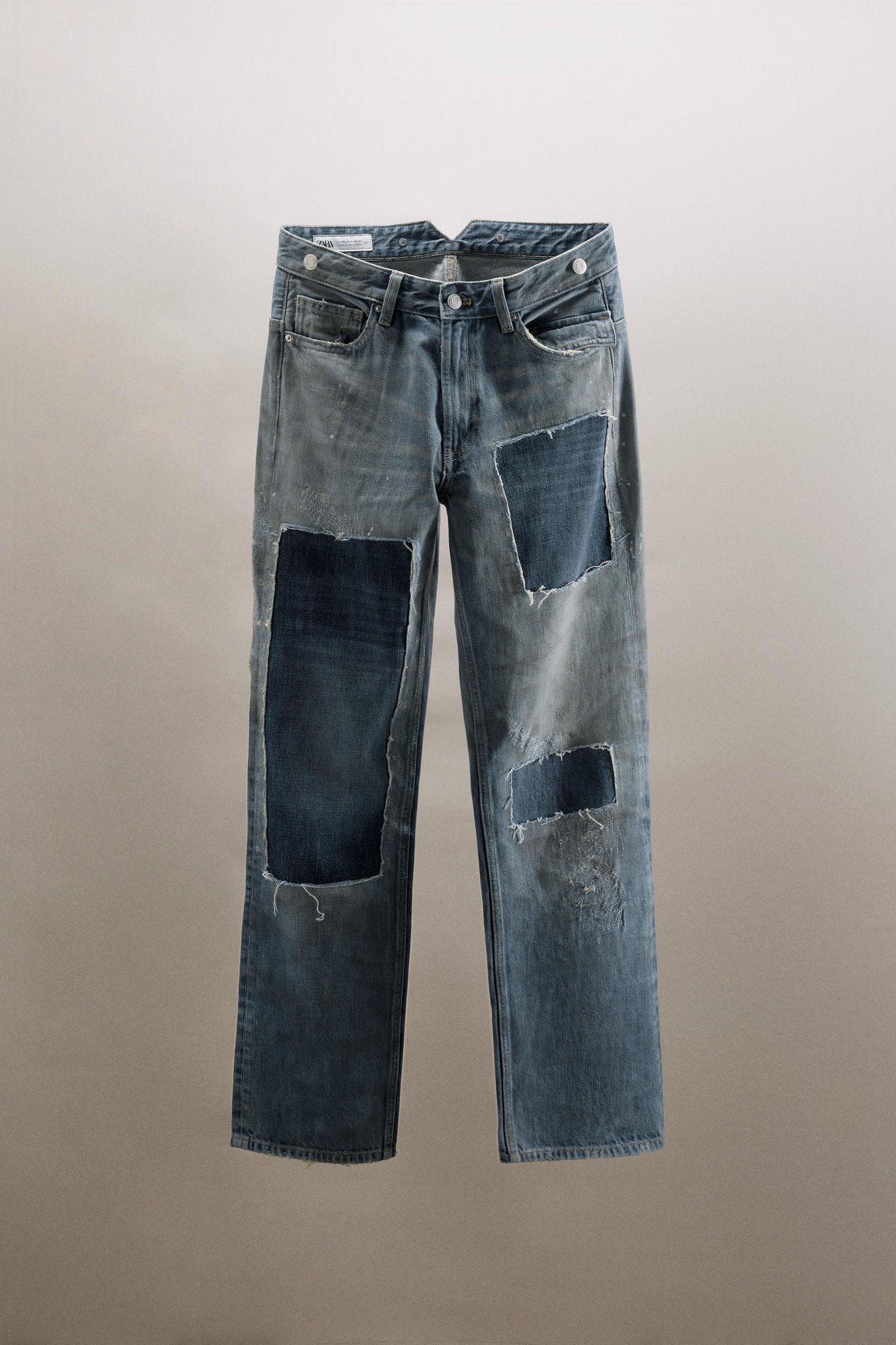 Ripped patch low-rise jeans