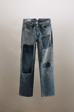 Ripped patch low-rise jeans