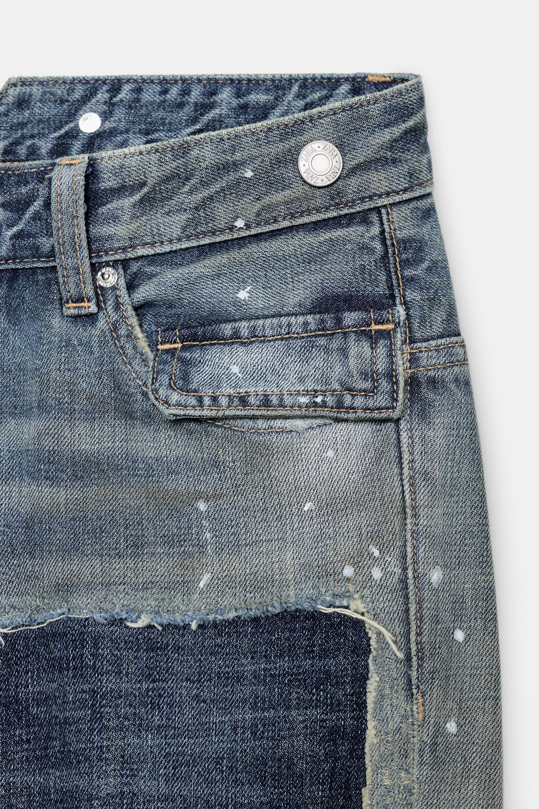 Ripped patch low-rise jeans