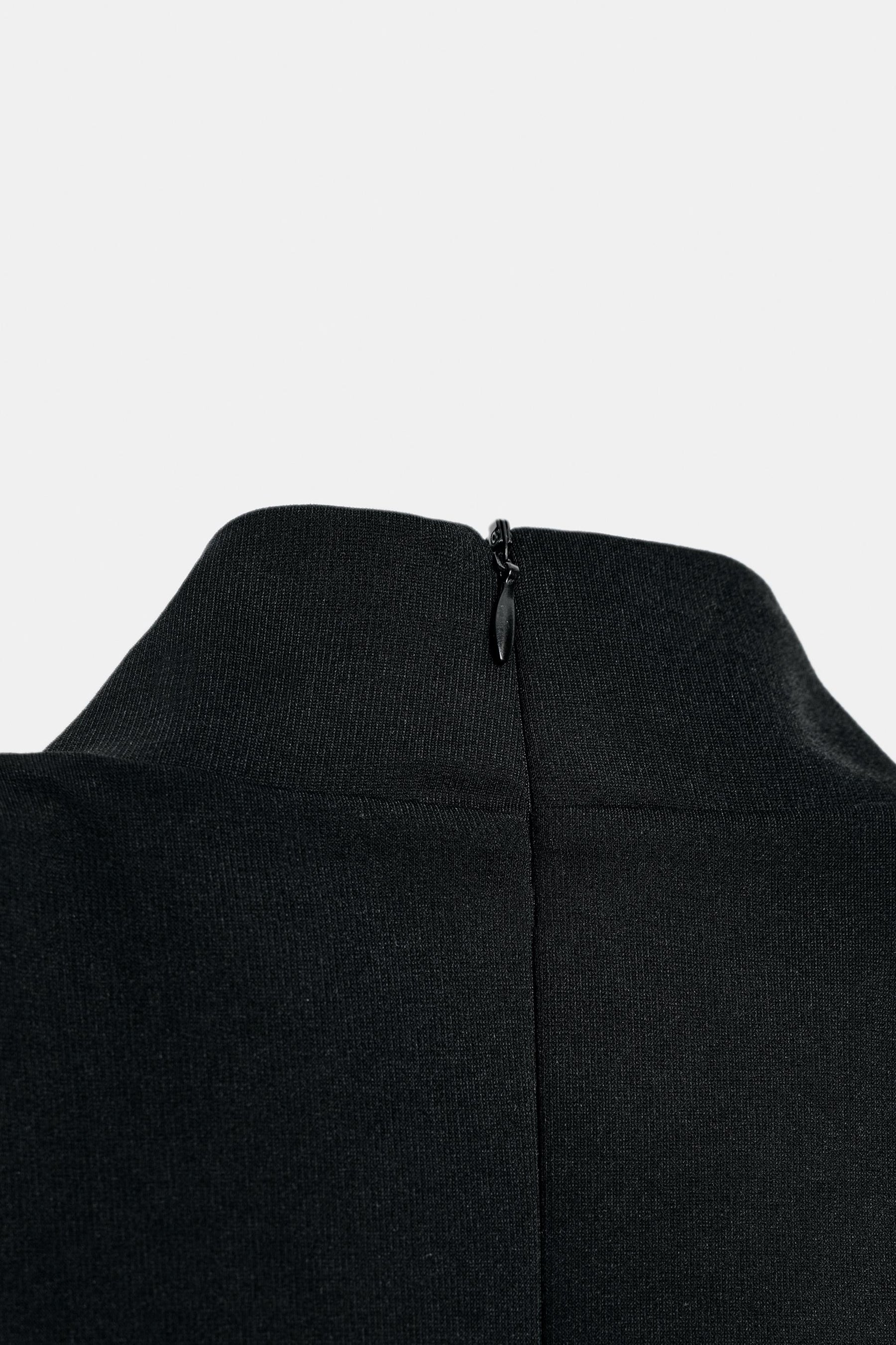 Peplum sleeveless top