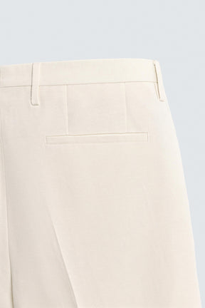 REGULAR FIT PLEATED TROUSERS - Image 10