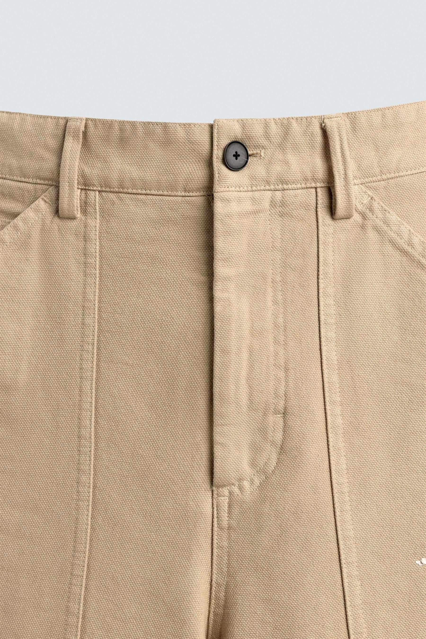 LIMITED EDITION PAINT SPLATTER TROUSERS - Image 9