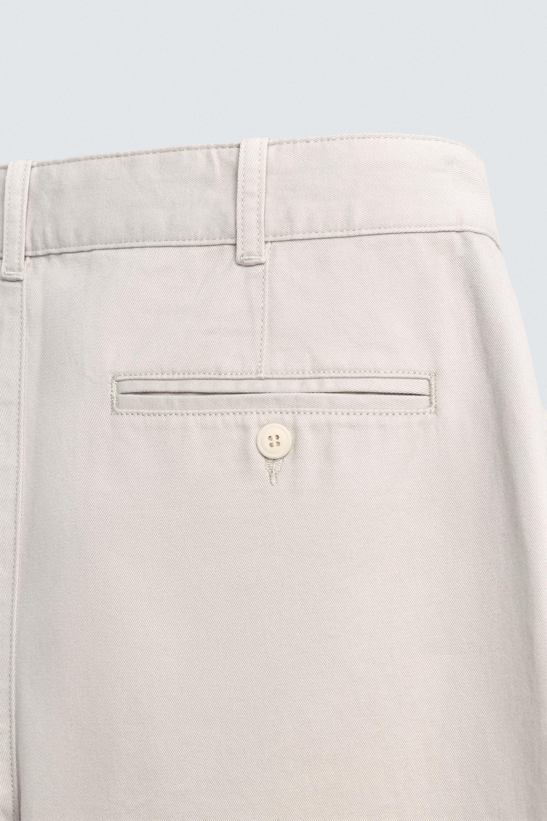 RELAXED FIT PLEATED TROUSERS - Image 9