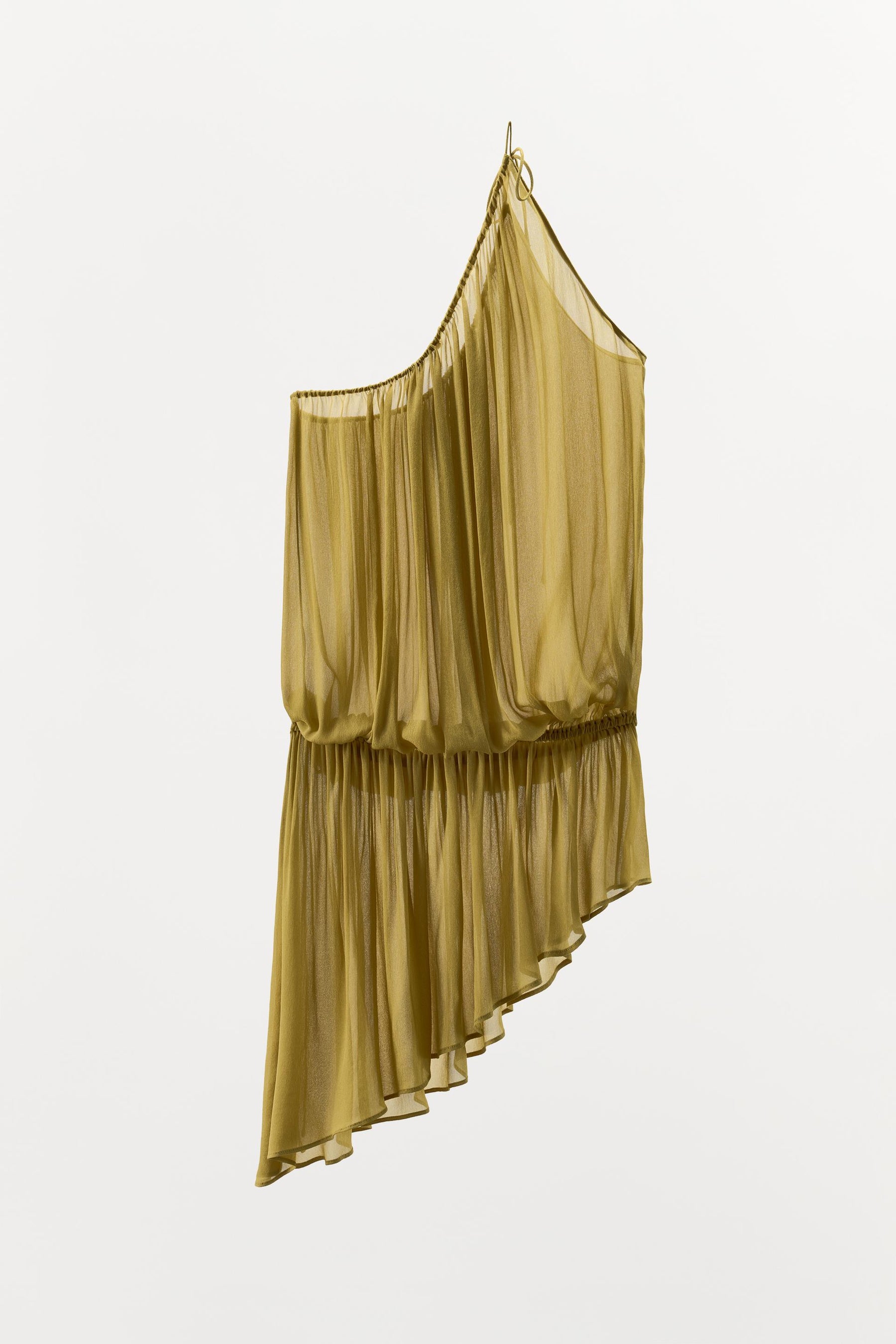 Asymmetric Tie-Accented Top