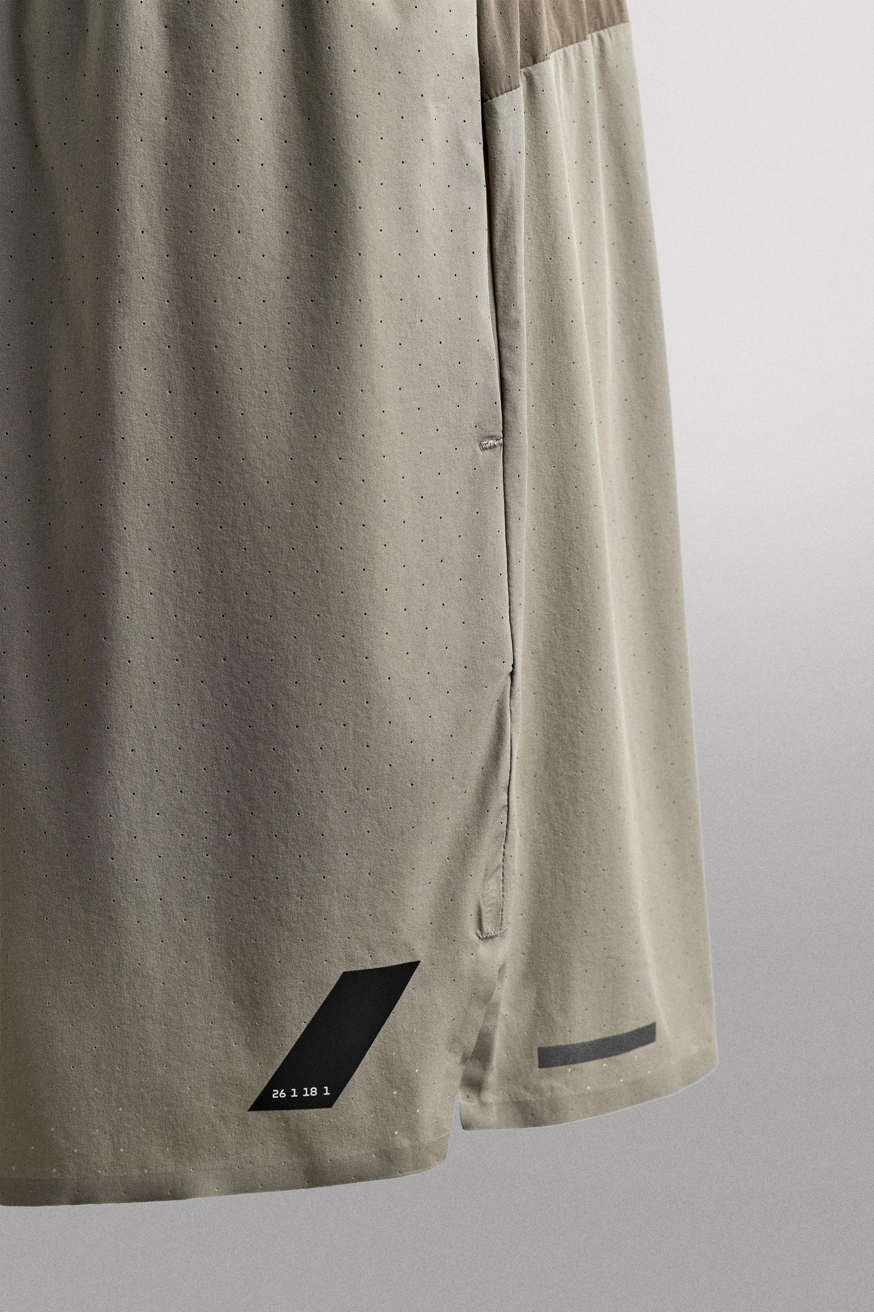 LIGHTWEIGHT PERFORATED SHORTS - Image 9