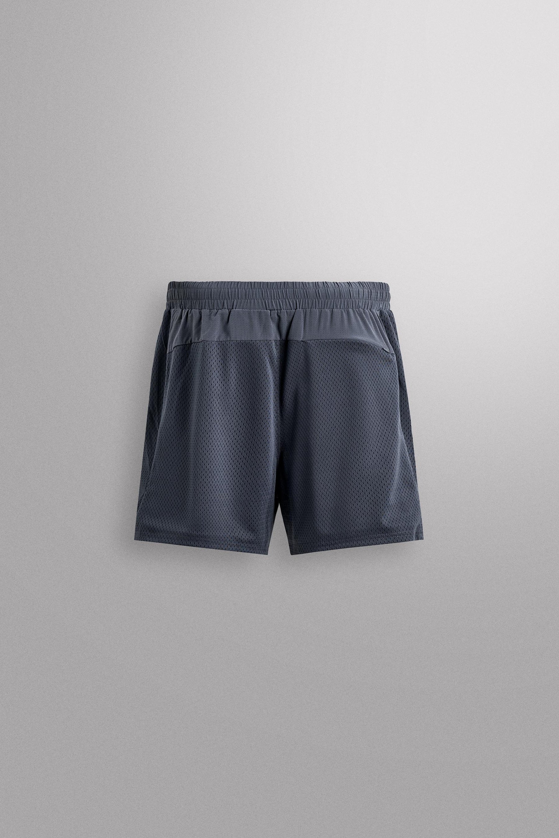 CONTRAST PERFORATED SHORTS - Image 9