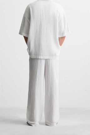 CRINKLED-EFFECT TROUSERS - Image 3