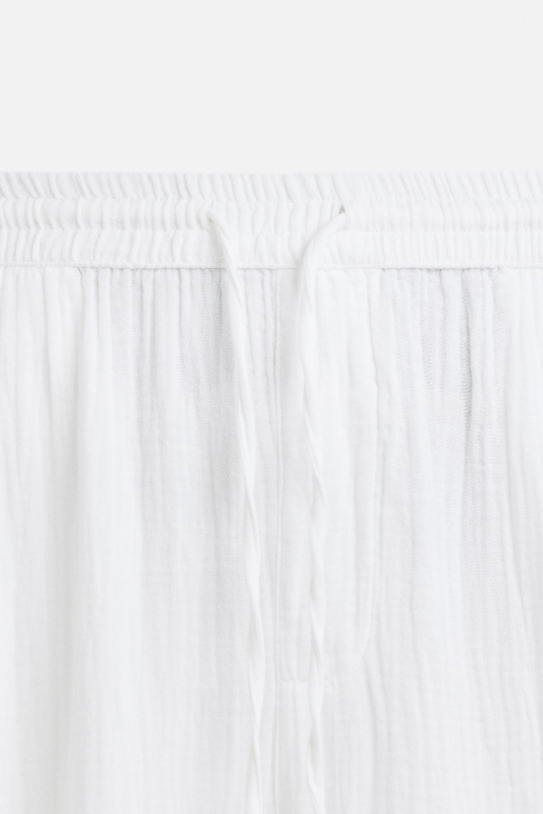 CRINKLED-EFFECT TROUSERS - Image 9