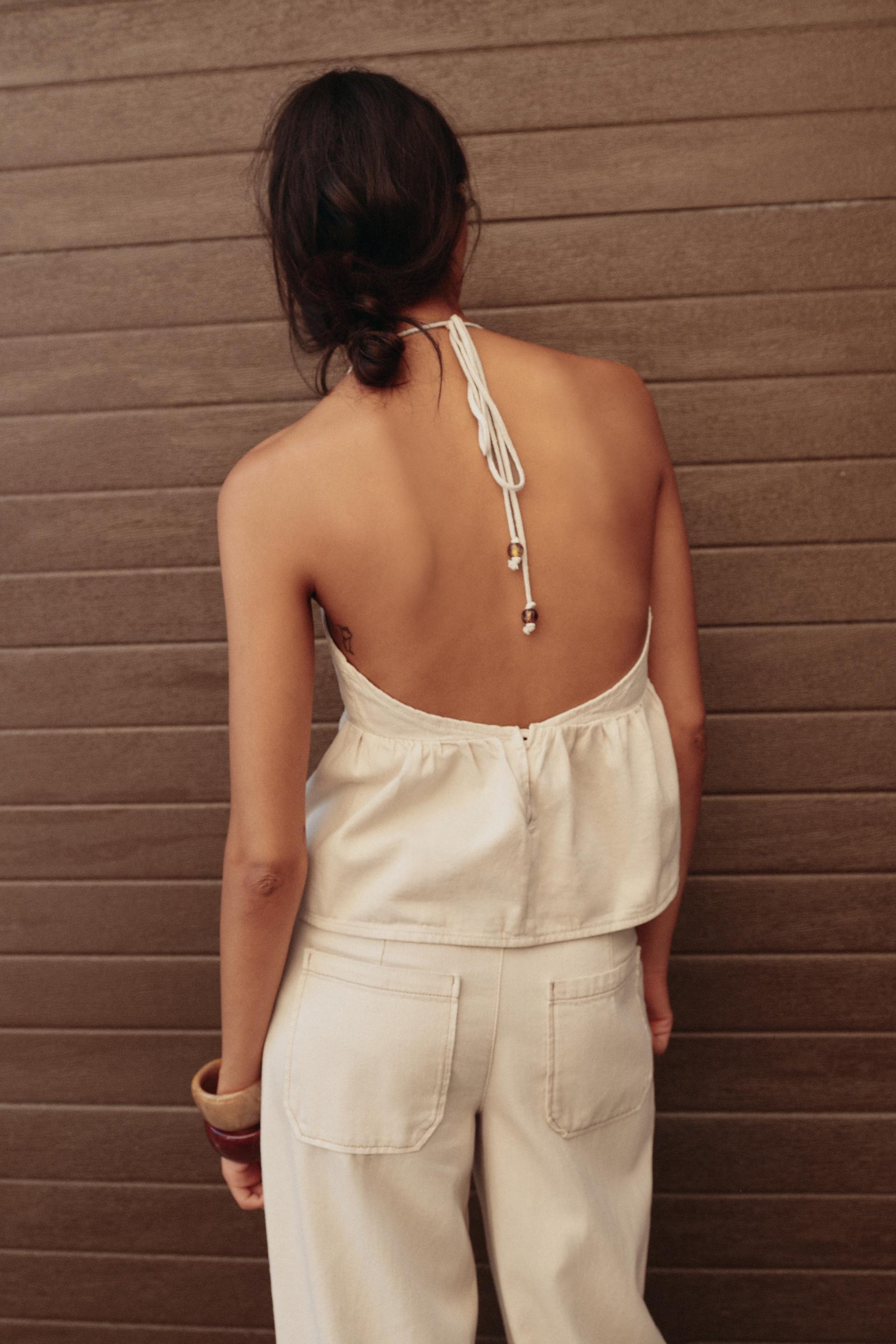 High-waist beaded jeans