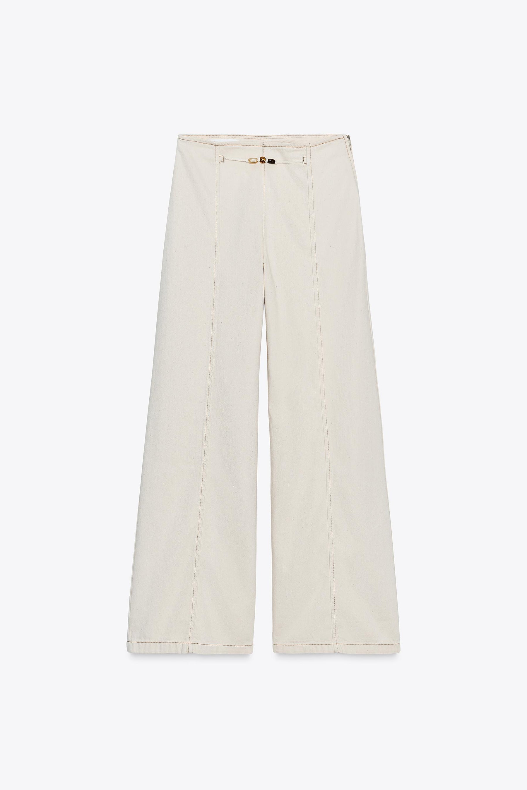 High-waist beaded jeans