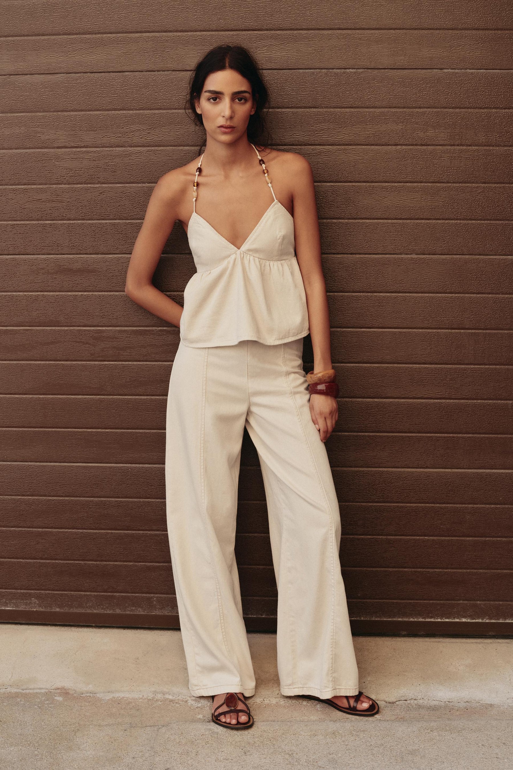 High-waist beaded jeans