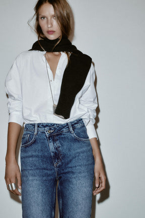 Straight high-waist cross-over jeans