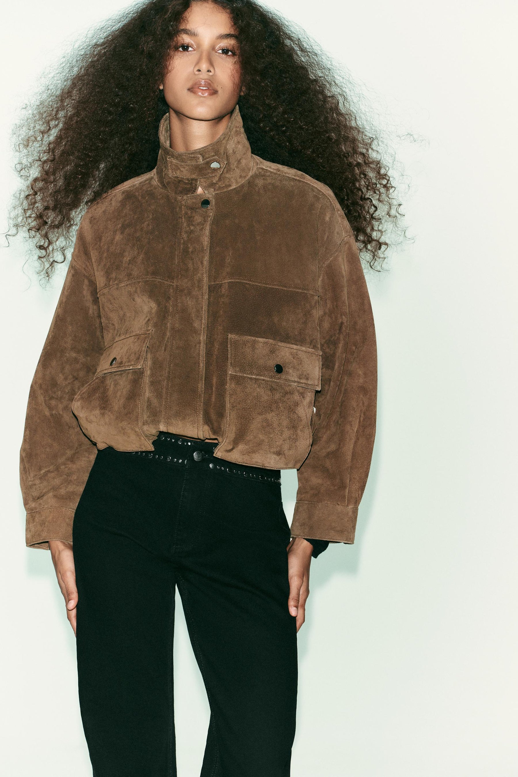 High-waist studded jeans