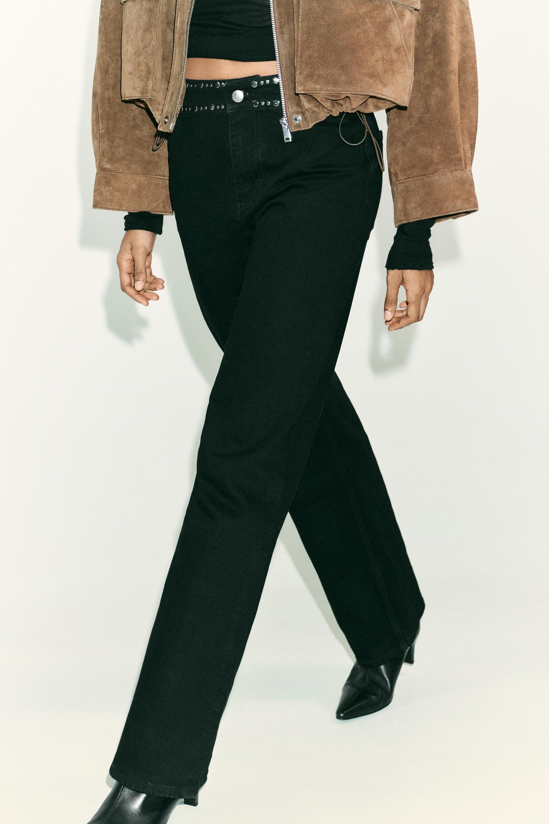 High-waist studded jeans