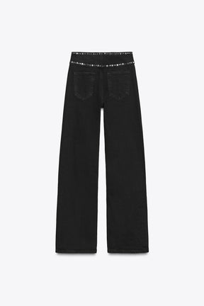 High-waist studded jeans