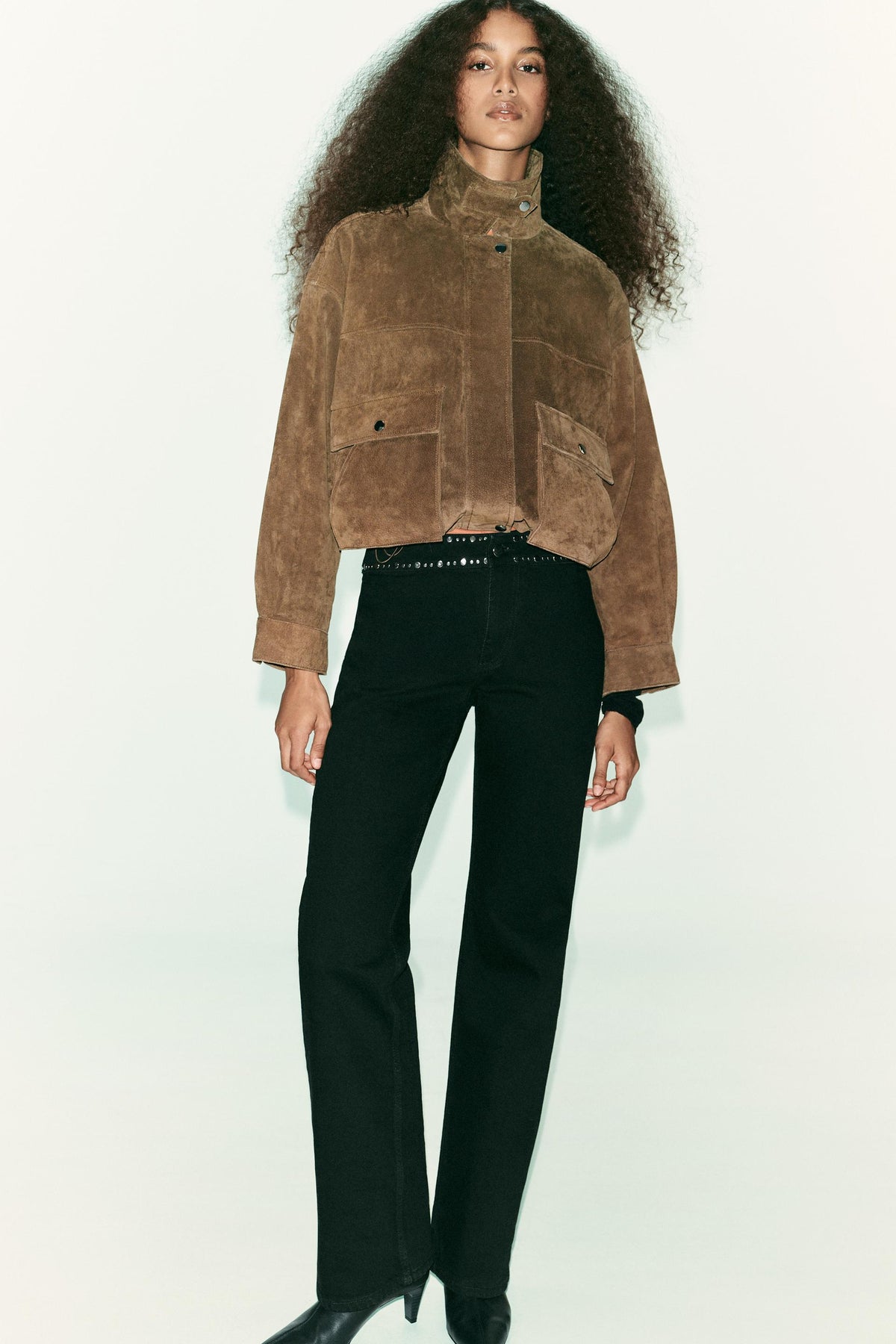 High-waist studded jeans