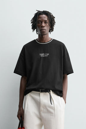 T-SHIRT WITH RAISED SLOGAN PRINTS - Image 2