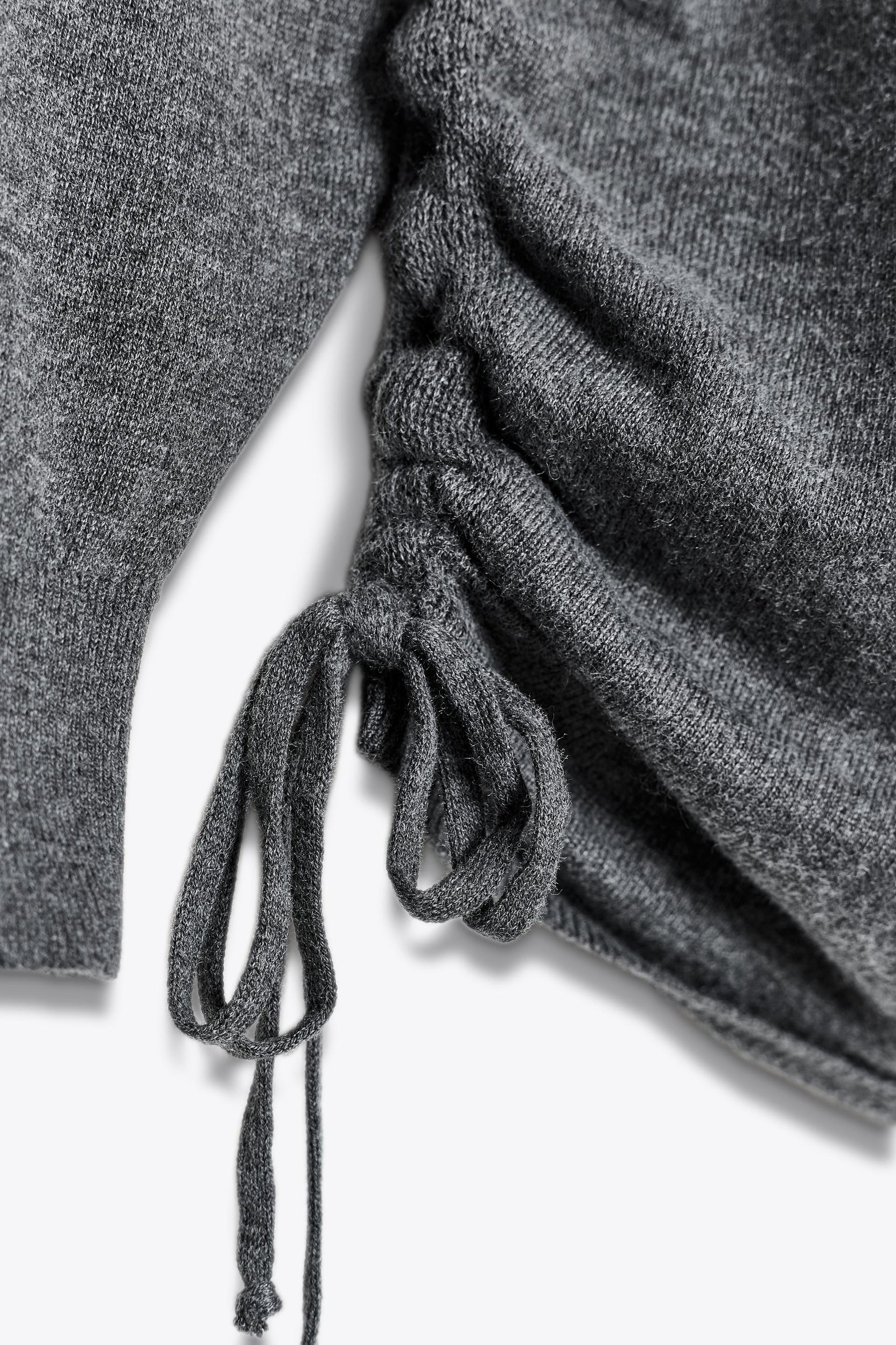 KNIT JUMPER WITH DRAWSTRINGS