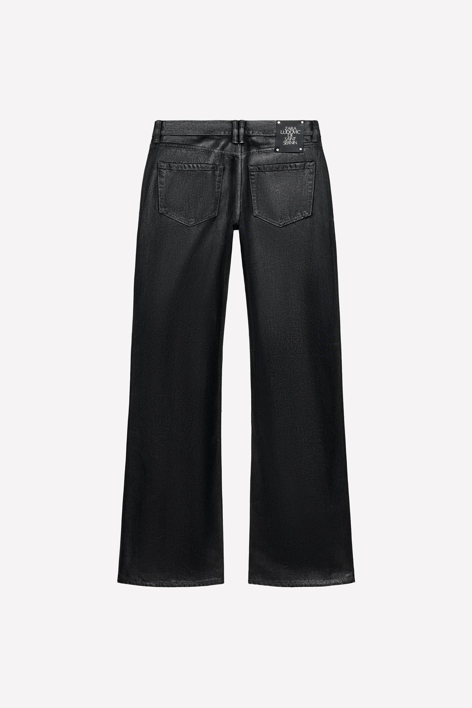 Waxed low-rise bootcut jeans