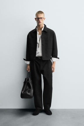 RELAXED FIT PLEATED TROUSERS - Image 1