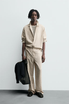 STRIPED WRINKLED-EFFECT FLOWING TROUSERS - Image 1