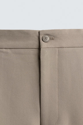 RELAXED FIT PLEATED TROUSERS - Image 9