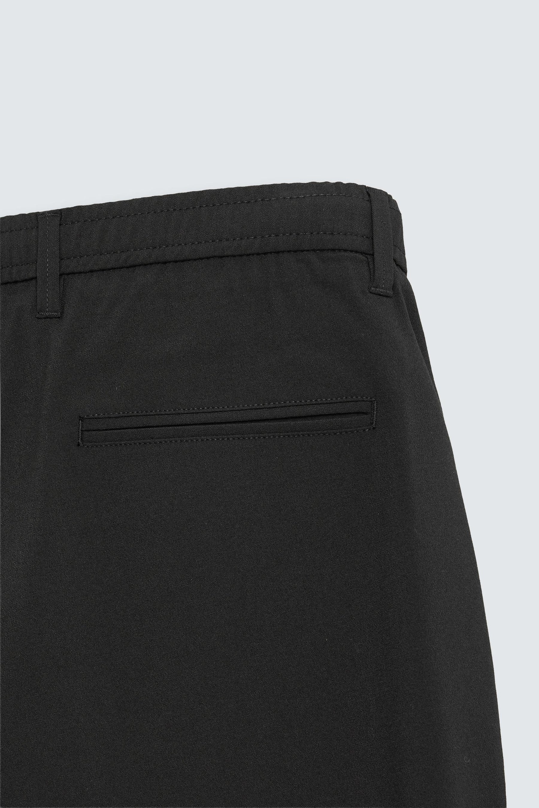 SLIM FIT COMFORT TROUSERS - Image 9