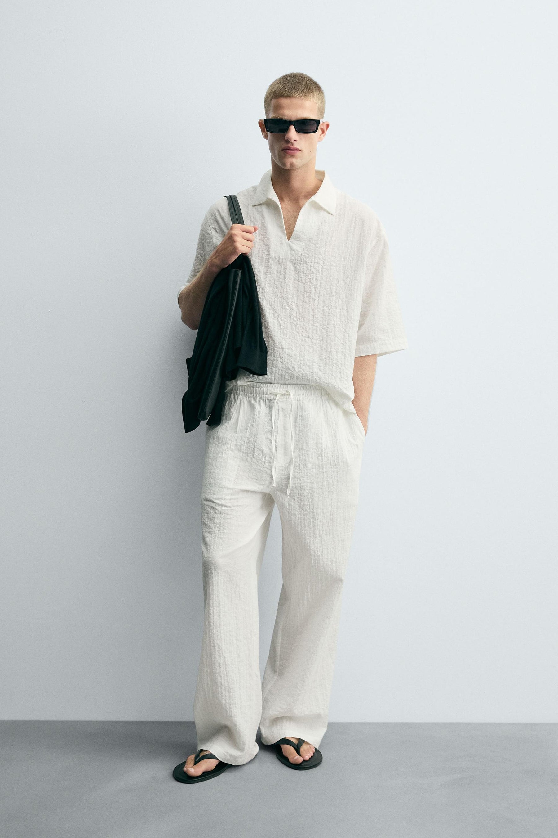 TEXTURED RELAXED FIT TROUSERS - Image 1