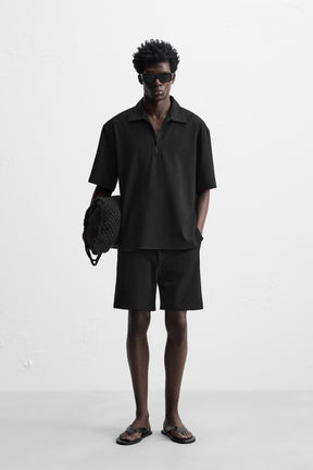 TECHNICAL ZIP-UP POLO SHIRT - Image 1