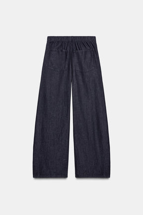 PLEATED DENIM TROUSERS