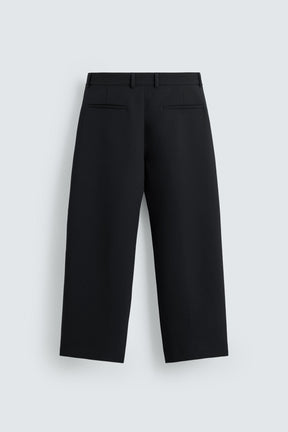PLEATED RELAXED TROUSERS