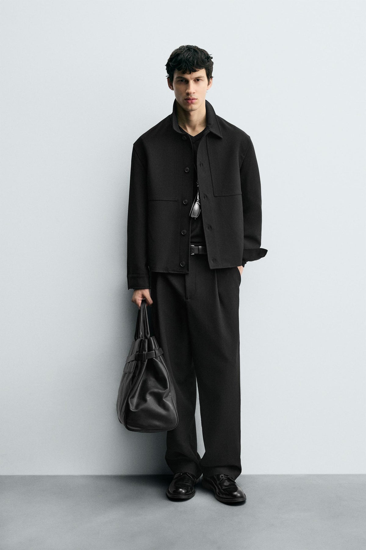 PLEATED RELAXED TROUSERS