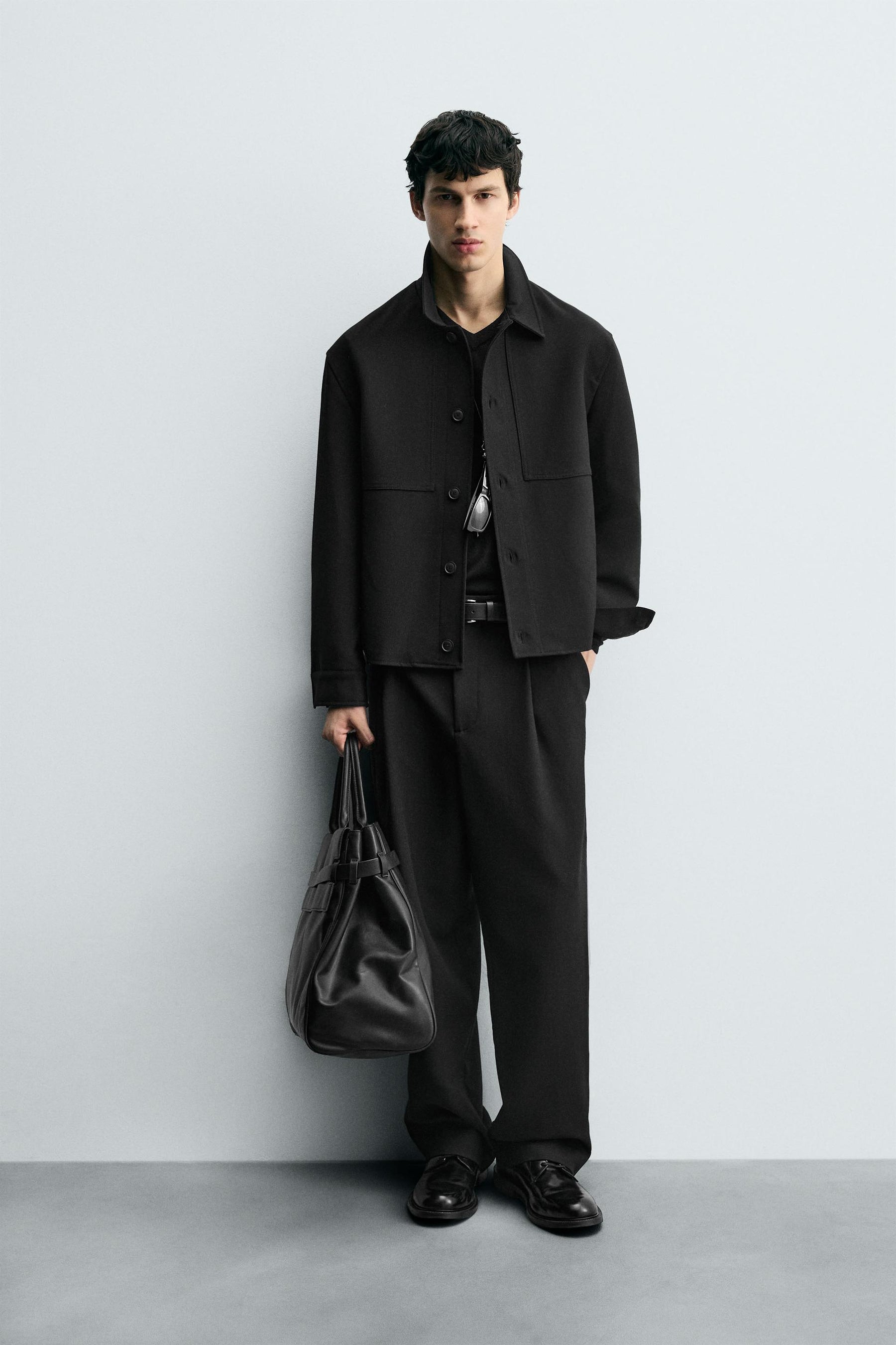PLEATED RELAXED TROUSERS