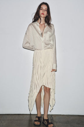 ASYMMETRIC PLEATED SKIRT