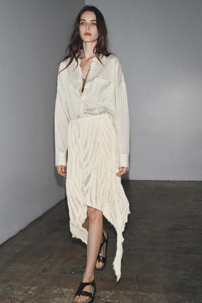 ASYMMETRIC PLEATED SKIRT