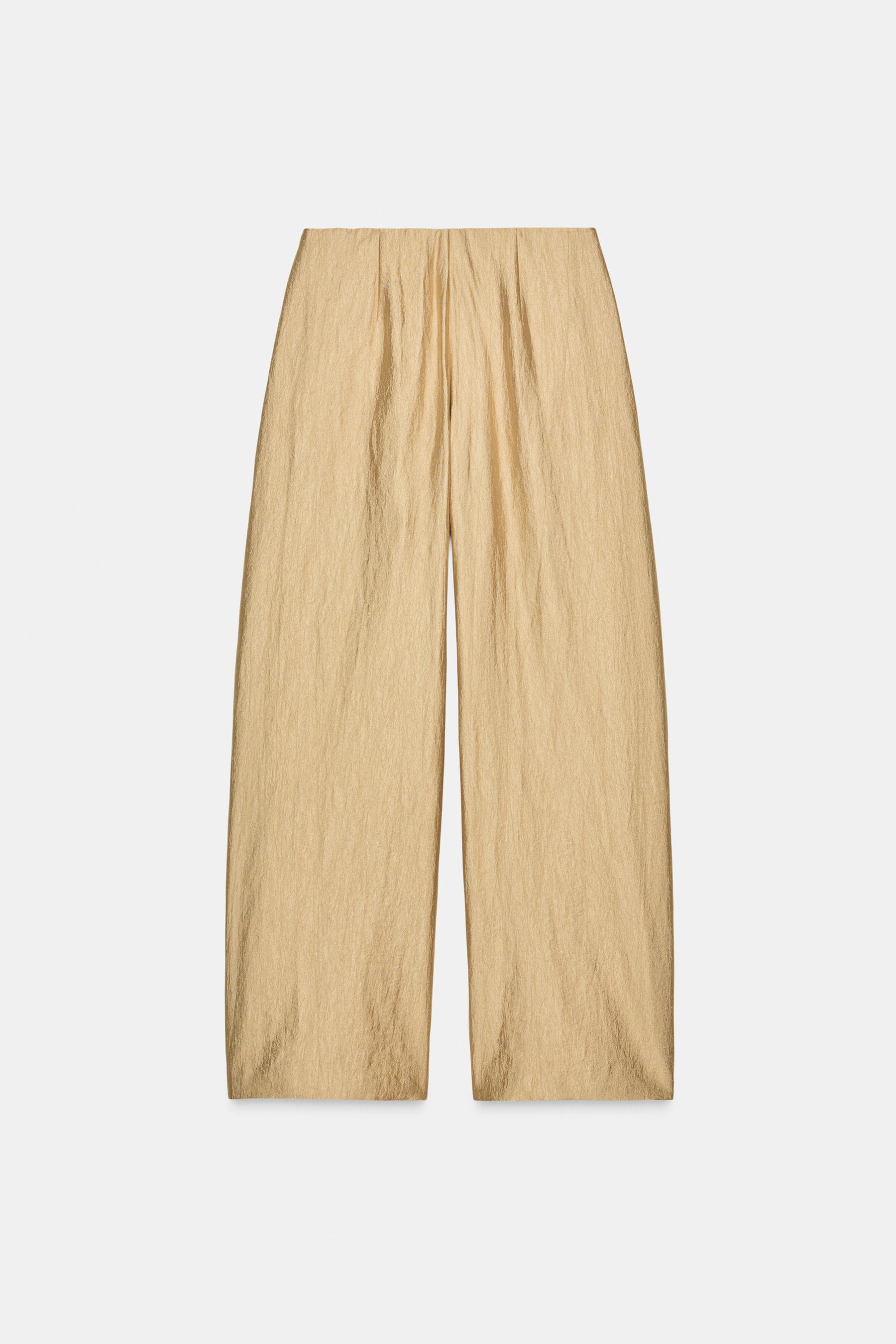 WIDE-LEG PLEATED TROUSERS