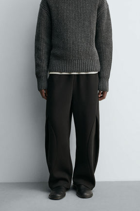 NEOPRENE-EFFECT PLEATED BALLOON FIT TROUSERS - Image 2