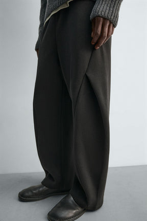 NEOPRENE-EFFECT PLEATED BALLOON FIT TROUSERS - Image 5