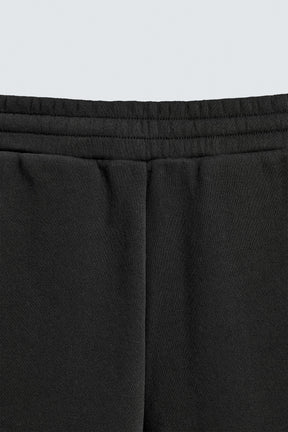 NEOPRENE-EFFECT PLEATED BALLOON FIT TROUSERS - Image 8