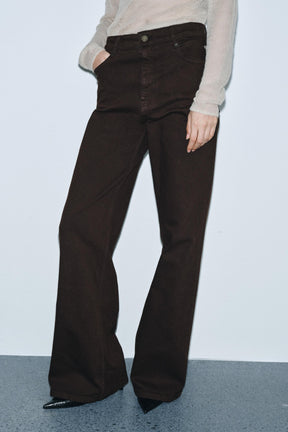 Breet Jeans mat héijer Taille 