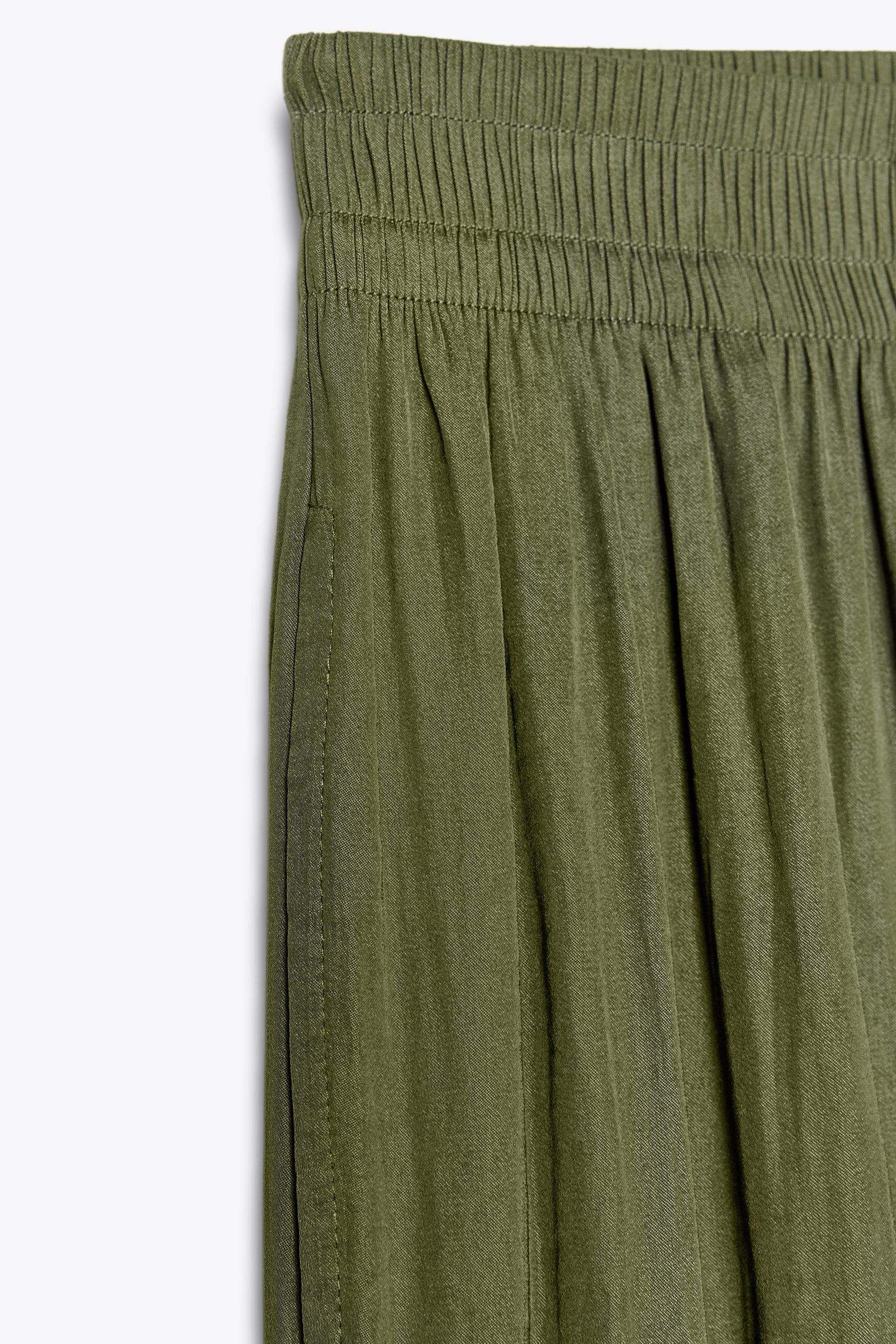 WIDE FLOWING TROUSERS