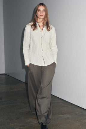 Wide-leg pleated trousers